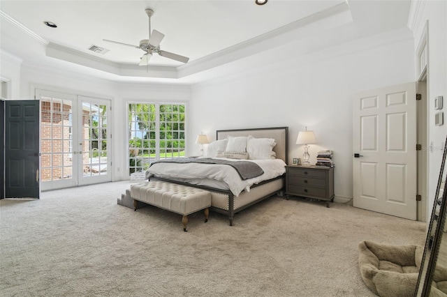 16502 Millan De Avila, Tampa, FL 33613 - bedroom featuring ornamental molding, carpet floors, access to exterior, a raised ceiling, and french doors