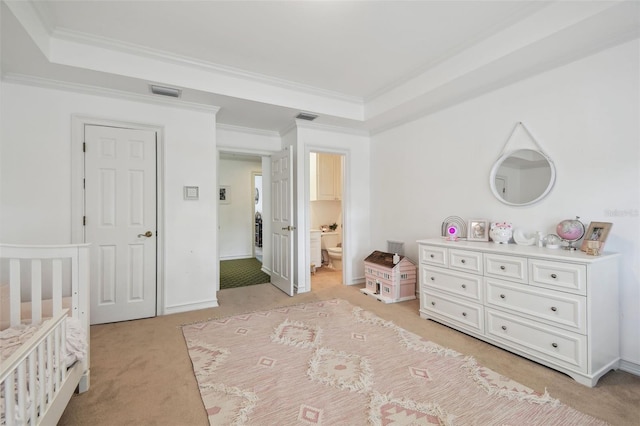 16502 Millan De Avila, Tampa, FL 33613 - bedroom featuring light carpet, a tray ceiling, ornamental molding, baseboards, and ensuite bath