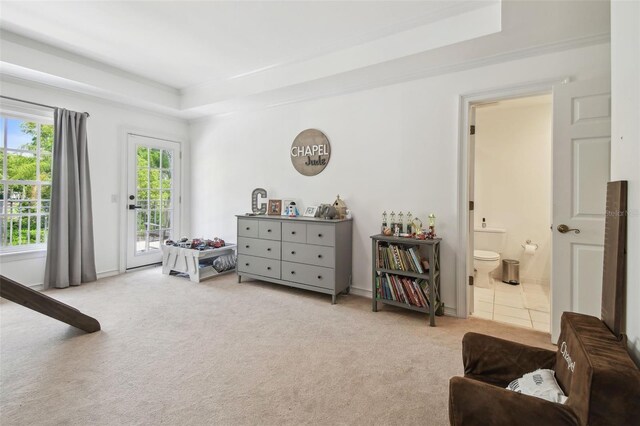 16502 Millan De Avila, Tampa, FL 33613 - carpeted bedroom featuring a raised ceiling, access to outside, ensuite bath, and baseboards