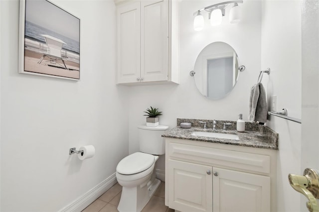 16502 Millan De Avila, Tampa, FL 33613 - half bath with toilet, vanity, baseboards, and tile patterned flooring