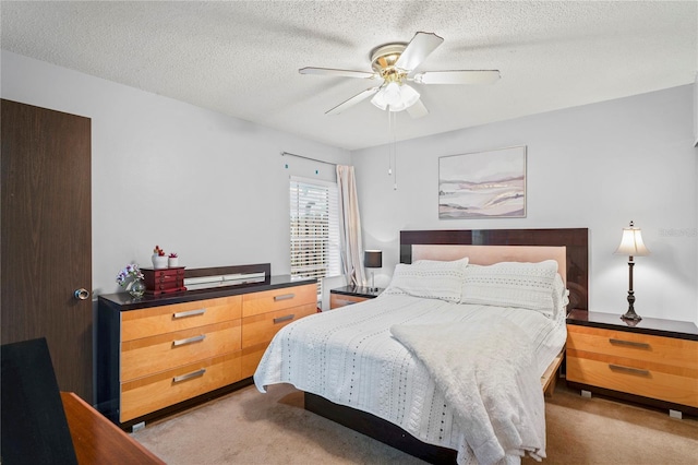 802 Antler Ct, Brandon, FL 33511 - bedroom featuring light colored carpet, a textured ceiling, and ceiling fan