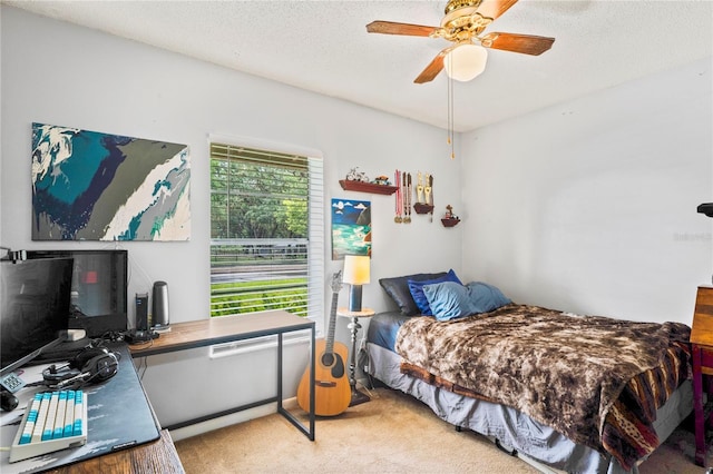 802 Antler Ct, Brandon, FL 33511 - carpeted bedroom with a desk, a textured ceiling, and a ceiling fan