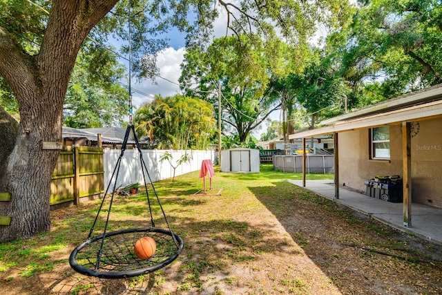 1403 W Pradera Ave, Tampa, FL 33612 - view of yard featuring a patio area