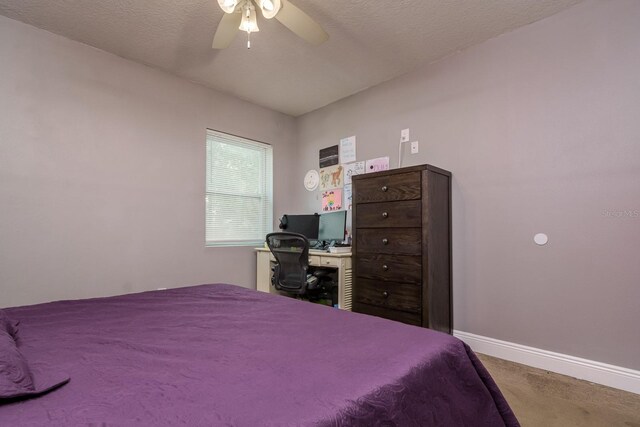 1403 W Pradera Ave, Tampa, FL 33612 - bedroom featuring carpet floors, baseboards, and a ceiling fan