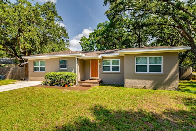 1403 W Pradera Ave, Tampa, FL 33612 - view of front facade with stucco siding