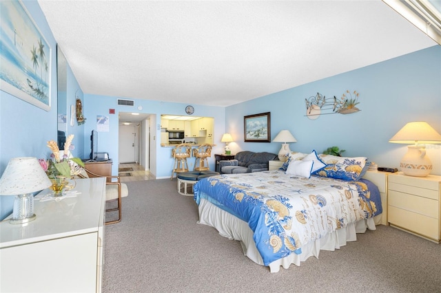 14950 Gulf Blvd Unit 905, Madeira Beach, FL 33708 - bedroom featuring light colored carpet