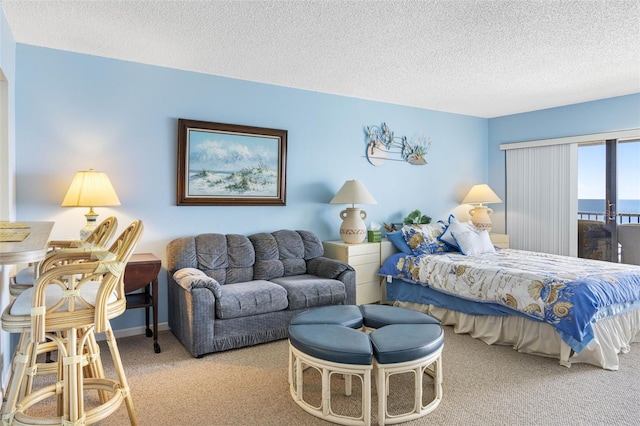 14950 Gulf Blvd Unit 905, Madeira Beach, FL 33708 - carpeted bedroom with a textured ceiling