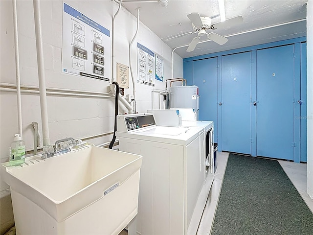 4725 Cove Cir Unit 908, Saint Petersburg, FL 33708 - shared laundry room featuring washer and dryer, a ceiling fan, water heater, and light colored carpet
