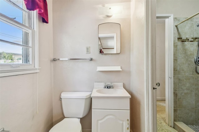 601 75th St N, Saint Petersburg, FL 33710 - bathroom with vanity, a shower stall, and toilet