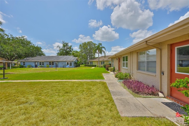 1904 Canterbury Ln Unit 18, Sun City Center, FL 33573 - view of grassy yard