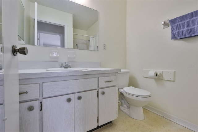 1904 Canterbury Ln Unit 18, Sun City Center, FL 33573 - full bath with vanity, toilet, baseboards, and a shower