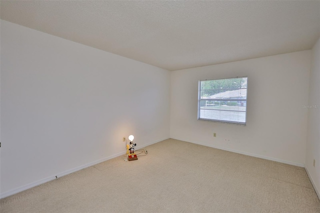 1904 Canterbury Ln Unit 18, Sun City Center, FL 33573 - carpeted empty room with baseboards