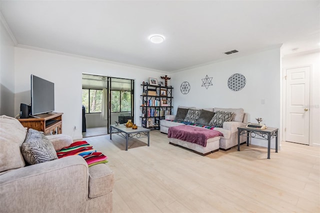 1400 Tarpon Woods Blvd Unit E4, Palm Harbor, FL 34685 - living area with ornamental molding, light wood-type flooring, and baseboards