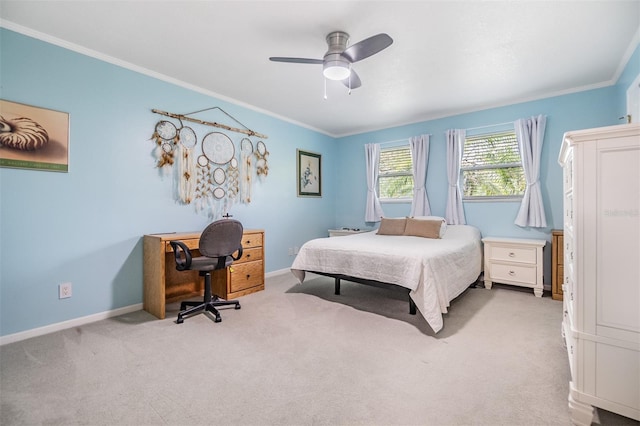1400 Tarpon Woods Blvd Unit E4, Palm Harbor, FL 34685 - carpeted bedroom with baseboards, ornamental molding, and ceiling fan