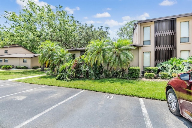 1400 Tarpon Woods Blvd Unit E4, Palm Harbor, FL 34685 - view of uncovered parking lot