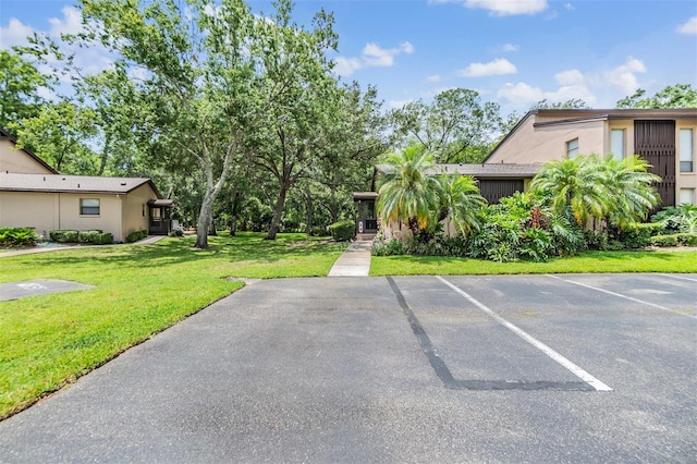 1400 Tarpon Woods Blvd Unit E4, Palm Harbor, FL 34685 - view of uncovered parking lot