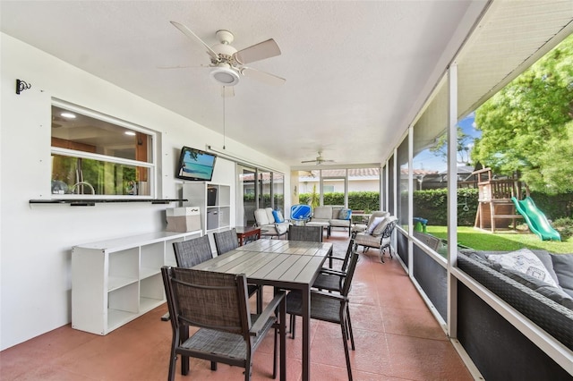 10387 Majestic Dr, Largo, FL 33774 - sunroom featuring an outdoor hangout area and a ceiling fan