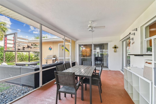 10387 Majestic Dr, Largo, FL 33774 - sunroom / solarium featuring ceiling fan and outdoor dining area
