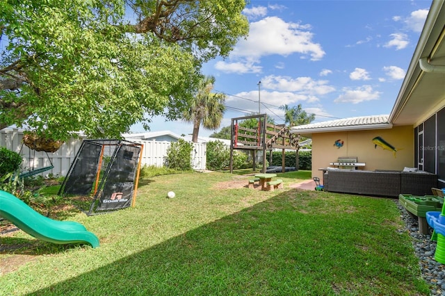 10387 Majestic Dr, Largo, FL 33774 - view of yard featuring an outdoor hangout area and a playground