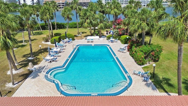 10387 Majestic Dr, Largo, FL 33774 - community pool featuring a water view and a patio