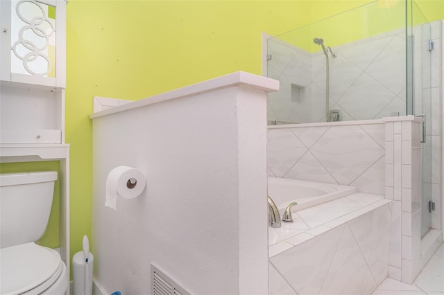 7833 Ontario Street Cir, Sarasota, FL 34243 - bathroom with a stall shower, a bath, and toilet