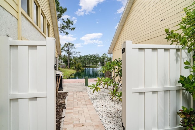 7833 Ontario Street Cir, Sarasota, FL 34243 - view of patio with a water view