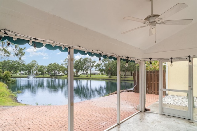 7833 Ontario Street Cir, Sarasota, FL 34243 - unfurnished sunroom with a water view, a ceiling fan, and lofted ceiling