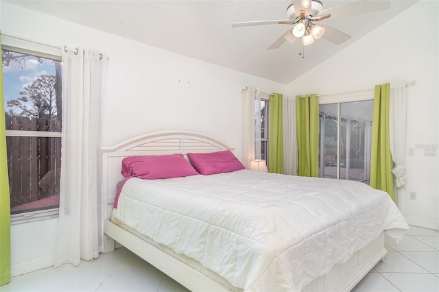 7833 Ontario Street Cir, Sarasota, FL 34243 - bedroom featuring tile patterned flooring, vaulted ceiling, access to exterior, and ceiling fan