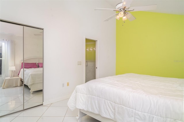 7833 Ontario Street Cir, Sarasota, FL 34243 - tiled bedroom featuring a towering ceiling and a ceiling fan