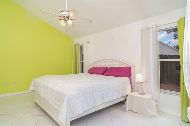 7833 Ontario Street Cir, Sarasota, FL 34243 - bedroom featuring vaulted ceiling, tile patterned flooring, and ceiling fan