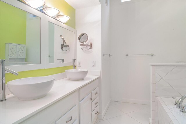 7833 Ontario Street Cir, Sarasota, FL 34243 - full bath featuring double vanity, tile patterned floors, and tiled bath