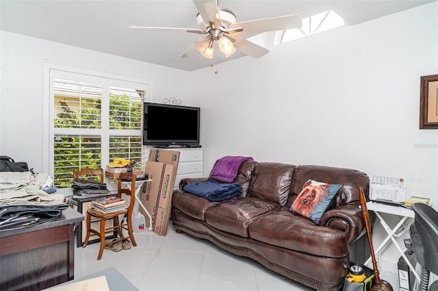 7833 Ontario Street Cir, Sarasota, FL 34243 - tiled living area with ceiling fan