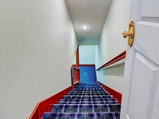 504 Riverside Dr Unit 504, Tarpon Springs, FL 34689 - staircase featuring recessed lighting