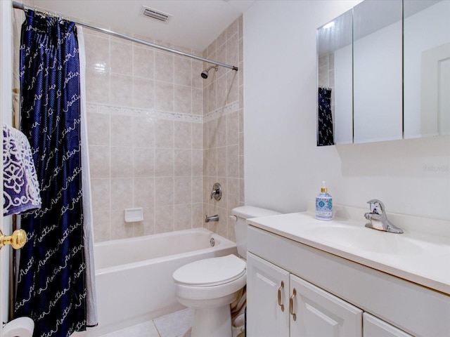 504 Riverside Dr Unit 504, Tarpon Springs, FL 34689 - bathroom featuring vanity, toilet, shower / bath combination with curtain, and tile patterned floors
