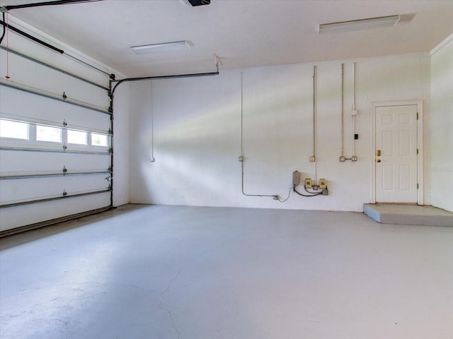 504 Riverside Dr Unit 504, Tarpon Springs, FL 34689 - garage featuring a garage door opener