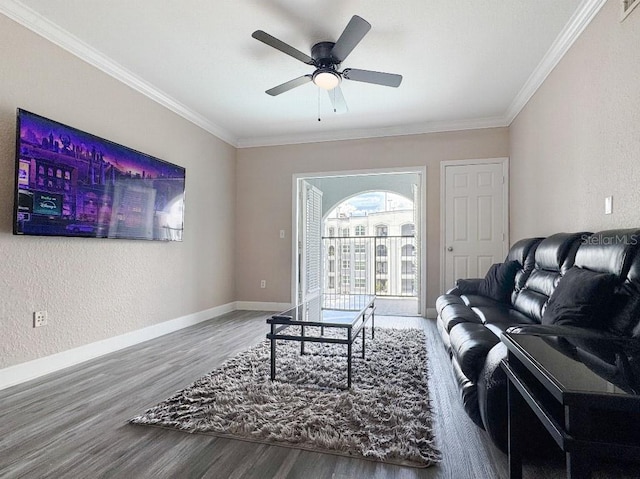 202 E S St Unit 5050, Orlando, FL 32801 - living area featuring wood finished floors, ornamental molding, ceiling fan, baseboards, and a textured wall