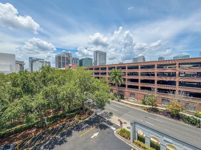 202 E S St Unit 5050, Orlando, FL 32801 - view of building exterior with a city view and uncovered parking