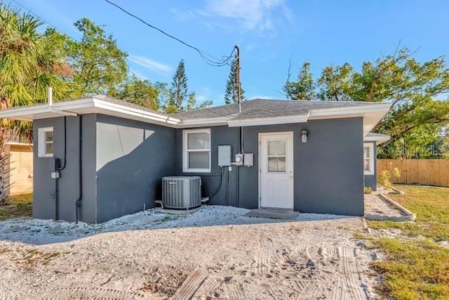 243 45th St N, Saint Petersburg, FL 33713 - back of property with central air condition unit