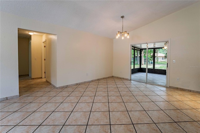 4032 Albany Rd, Labelle, FL 33935 - unfurnished room with lofted ceiling, a chandelier, and light tile patterned floors