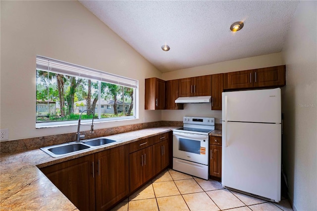 4032 Albany Rd, Labelle, FL 33935 - kitchen featuring white appliances, under cabinet range hood, a sink, lofted ceiling, and a textured ceiling