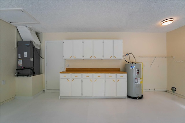 4032 Albany Rd, Labelle, FL 33935 - below grade area featuring water heater, a textured ceiling, heating unit, and baseboards