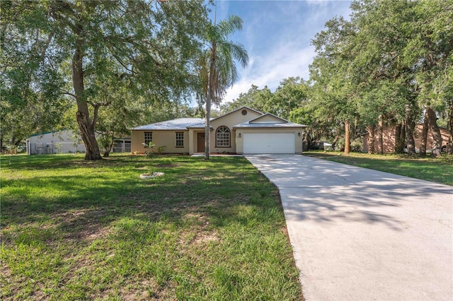 4032 Albany Rd, Labelle, FL 33935 - single story home with a garage, concrete driveway, a front lawn, stucco siding, and metal roof