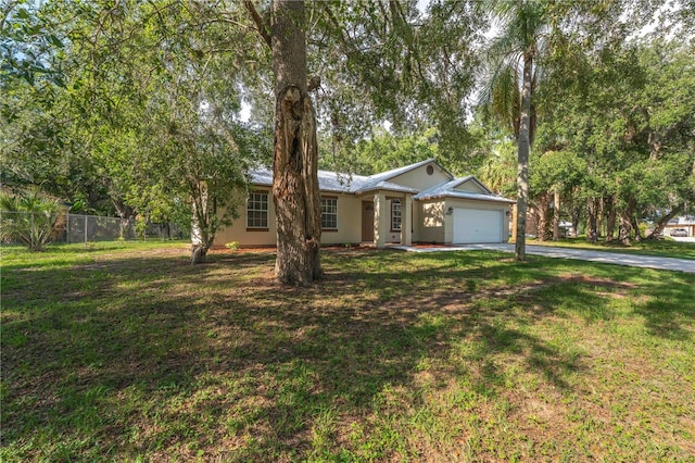 4032 Albany Rd, Labelle, FL 33935 - ranch-style house with asphalt driveway and an attached garage