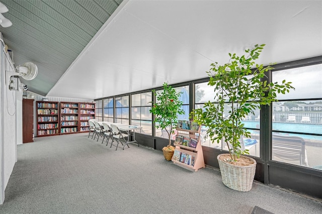 1109 Pine Ridge Cir W Unit C1, Tarpon Springs, FL 34688 - sunroom with lofted ceiling