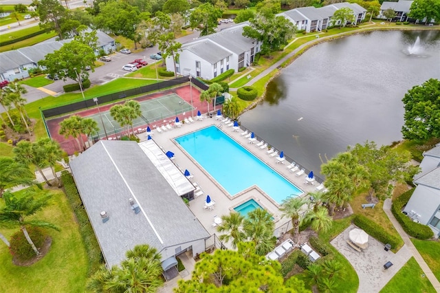 1109 Pine Ridge Cir W Unit C1, Tarpon Springs, FL 34688 - aerial view of a pool and a large body of water