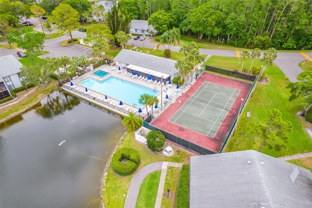 1109 Pine Ridge Cir W Unit C1, Tarpon Springs, FL 34688 - bird's eye view of a pool and a nearby body of water