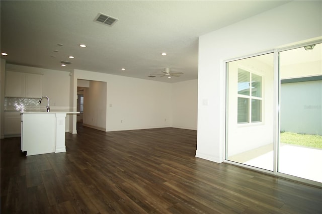 9512 Summers Cay Cir, Thonotosassa, FL 33592 - unfurnished living room with dark wood finished floors, recessed lighting, a ceiling fan, and baseboards