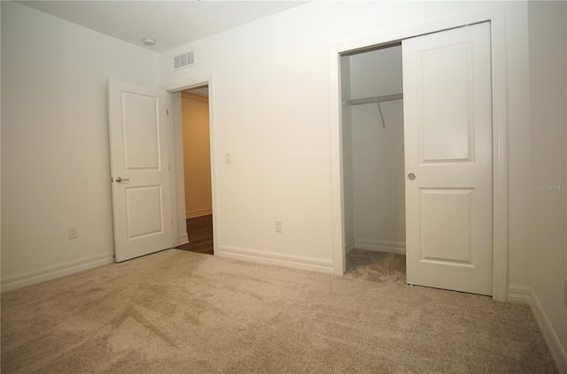 9512 Summers Cay Cir, Thonotosassa, FL 33592 - unfurnished bedroom with carpet floors, a closet, and baseboards