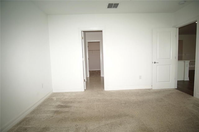 9512 Summers Cay Cir, Thonotosassa, FL 33592 - unfurnished bedroom with carpet, baseboards, and a spacious closet