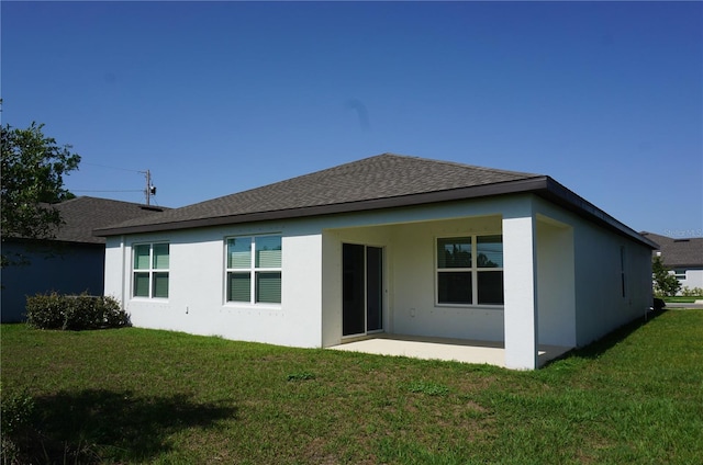 9512 Summers Cay Cir, Thonotosassa, FL 33592 - rear view of property with a patio area, a yard, stucco siding, and a shingled roof